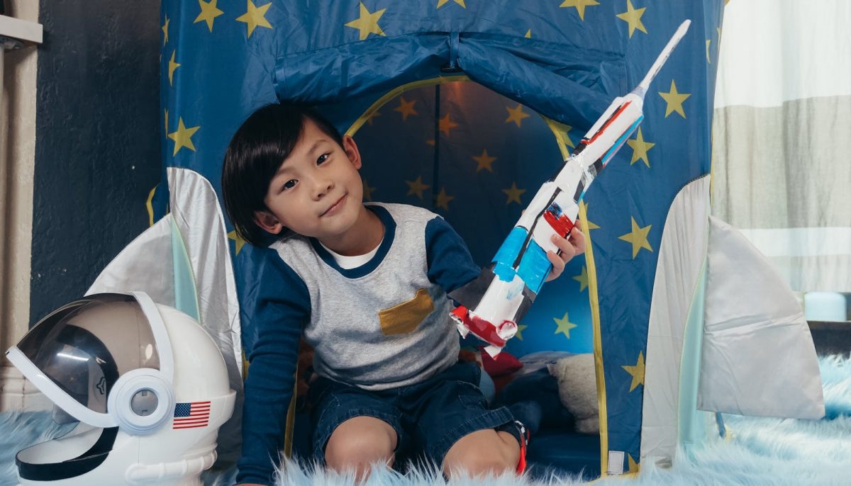 Young Boy Playing a Toy