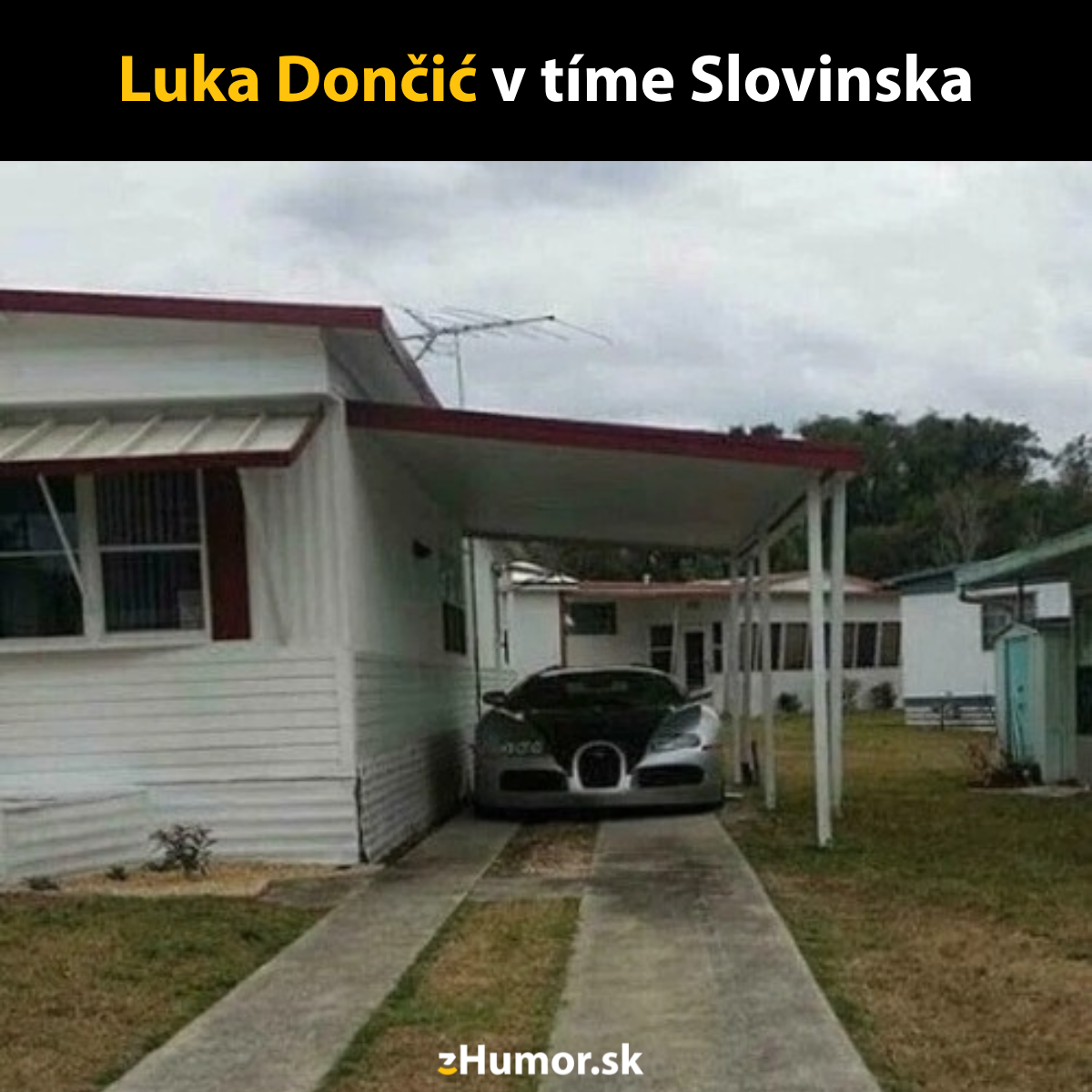 Auto Bugatti zaparkované pod prístreškom vedľa mobilného domu na trávniku.