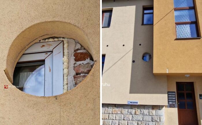 Guľaté okno s nesprávnou inštaláciou v omietnutej stene budovy.