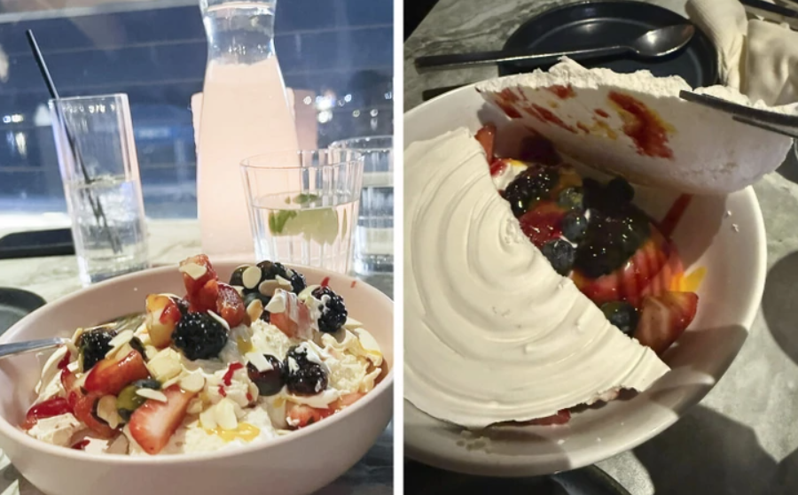 Dezert z čerstvého ovocia s polevou a rozseknutou snehovou pusinkou na tanieri, vedľa nápoje.