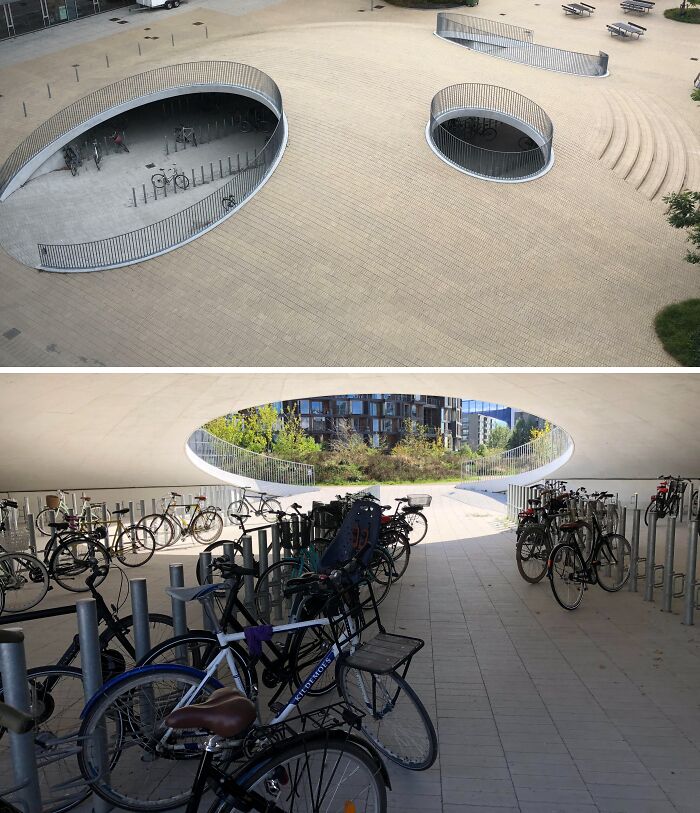 Moderné podzemné parkovisko pre bicykle s kreatívnym dizajnom a otvormi na povrchu.