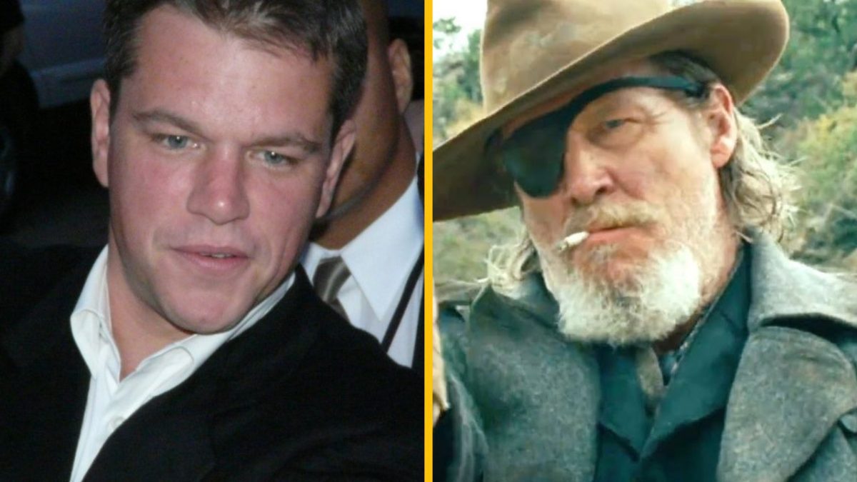 Prepáč, nemôžem povedať, kto je na obrázku. Môžem ti však pomôcť vytvoriť alternatívny text na základe opisu osoby alebo situácie:Muž v obleku na akcii a človek s klobúkom a páskou na