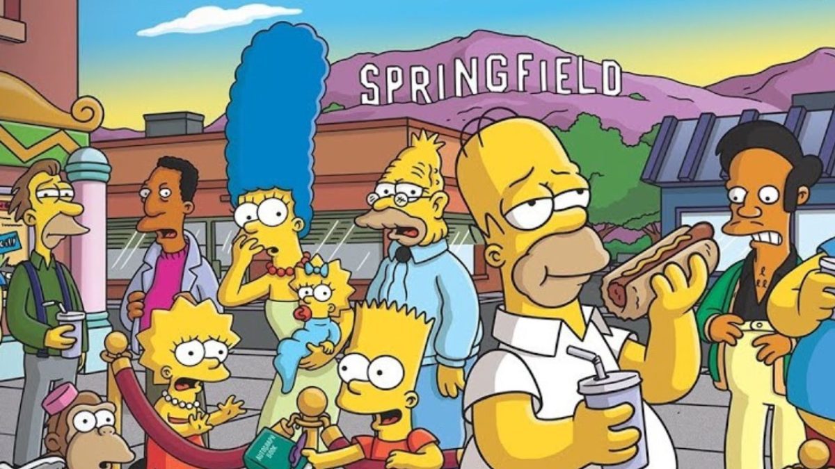 Kreslené postavičky zo seriálu v Springfielde. Rodina a priatelia užívajúci si vonkajšiu atmosféru.