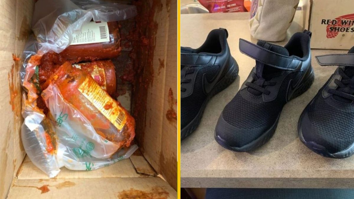 Rozbitá sklenená nádoba s omáčkou v balení vedľa dvojice čiernych tenisiek na stole.