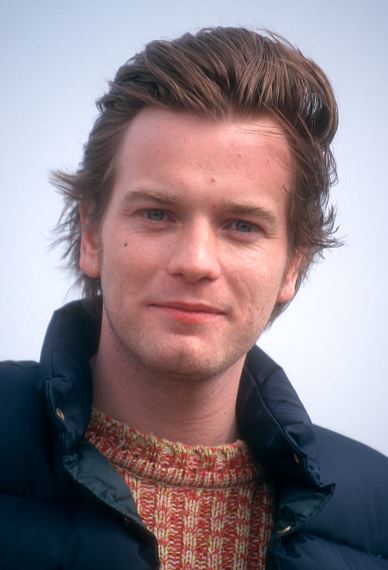 Nepoznám túto osobu, ale obrázok zobrazuje muža v zimnom oblečení s neutrálnym pozadím, tvár smeruje do kamery.