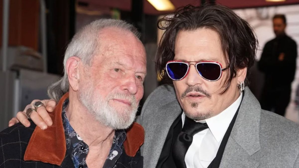 Ložím sa, že ide o dvoch mužov pri slávnostnej príležitosti, jeden je v slnečných okuliaroch a druhý má sivé vlasy.