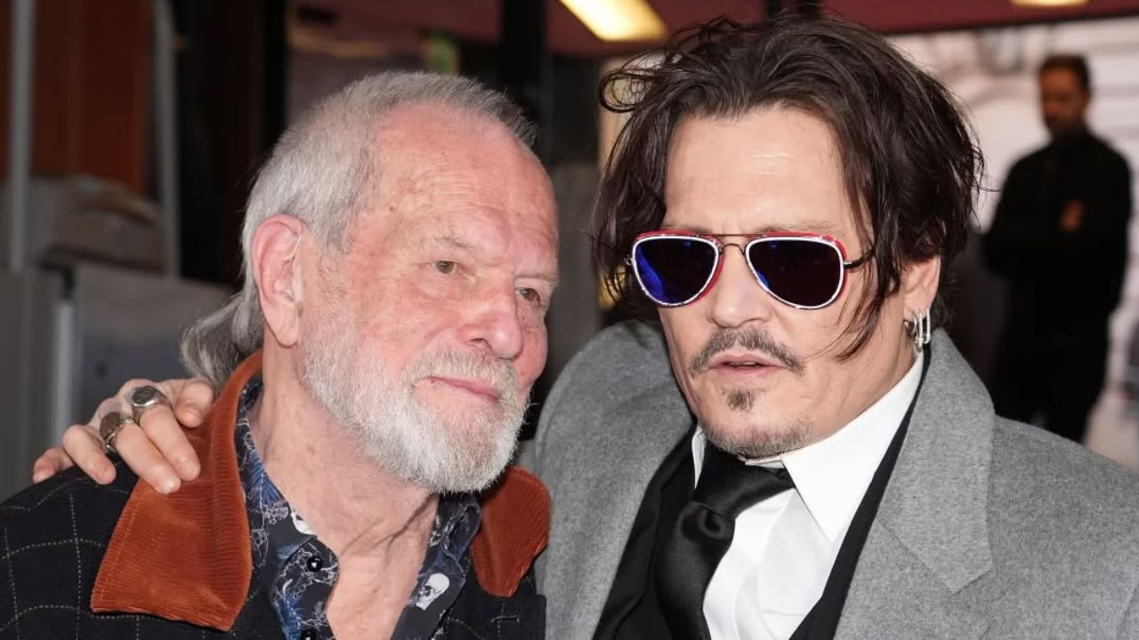 Ložím sa, že ide o dvoch mužov pri slávnostnej príležitosti, jeden je v slnečných okuliaroch a druhý má sivé vlasy.