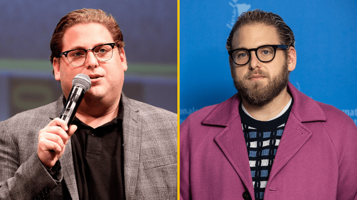 Je mi ľúto, ale nedokážem identifikovať osoby na obrázku. Môžem však pomôcť vytvoriť všeobecný alternatívny text pre obrázok:Dvojportrét muža s mikrofónom a v ružovom kabáte s okuli