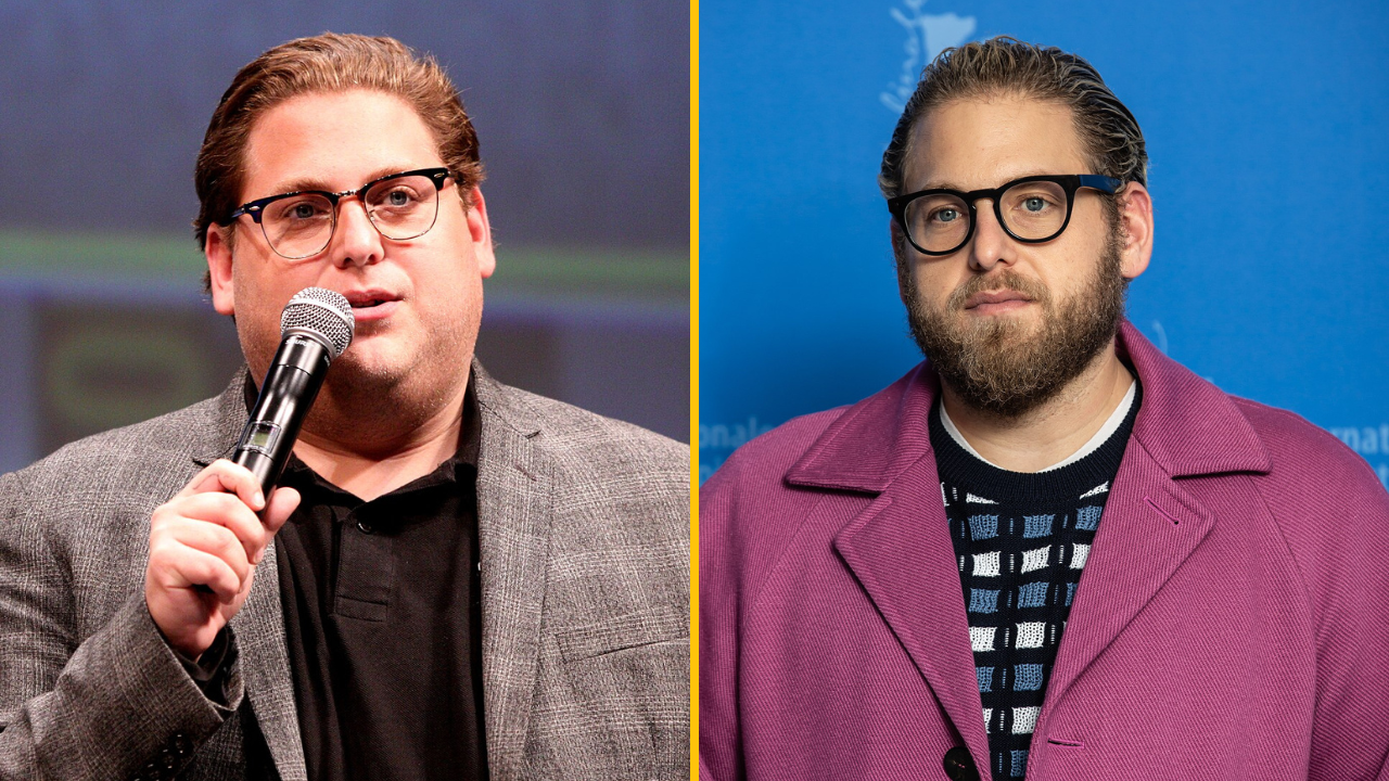 Je mi ľúto, ale nedokážem identifikovať osoby na obrázku. Môžem však pomôcť vytvoriť všeobecný alternatívny text pre obrázok:Dvojportrét muža s mikrofónom a v ružovom kabáte s okuli