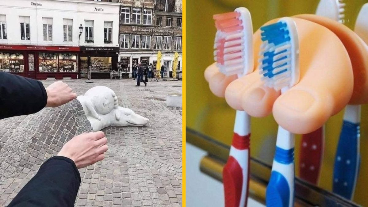 Ľudia fotografujú optickú ilúziu so sochou v meste a zvláštnym držiakom na zubné kefky v tvare rúk.