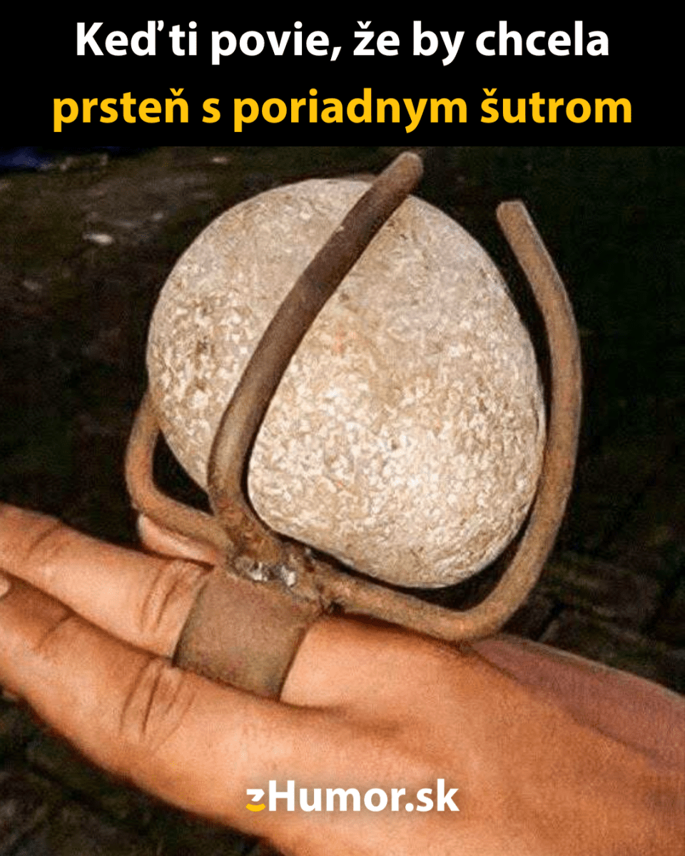 Osoba s obrovským prsteňom so skutočne veľkým kameňom, vtipná interpretácia prsteňa s veľkým šutrom.