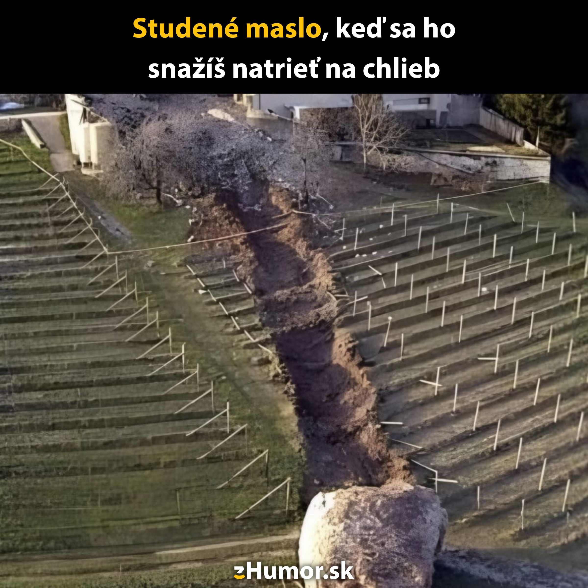 Krajina s veľkou puklinou a posunutou pôdou, žartovne prirovnaná k natieraniu studeného masla na chlieb.