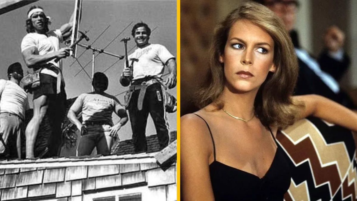 Skupina mužov na streche a žena v elegantných šatách vo vnútri; kontrast medzi prácou a eleganciou.