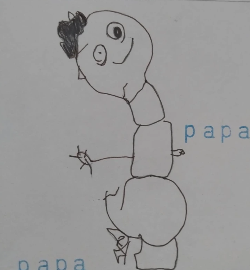 Detská kresba osoby s úsmevom a vlasy, vedľa nápisu papa.