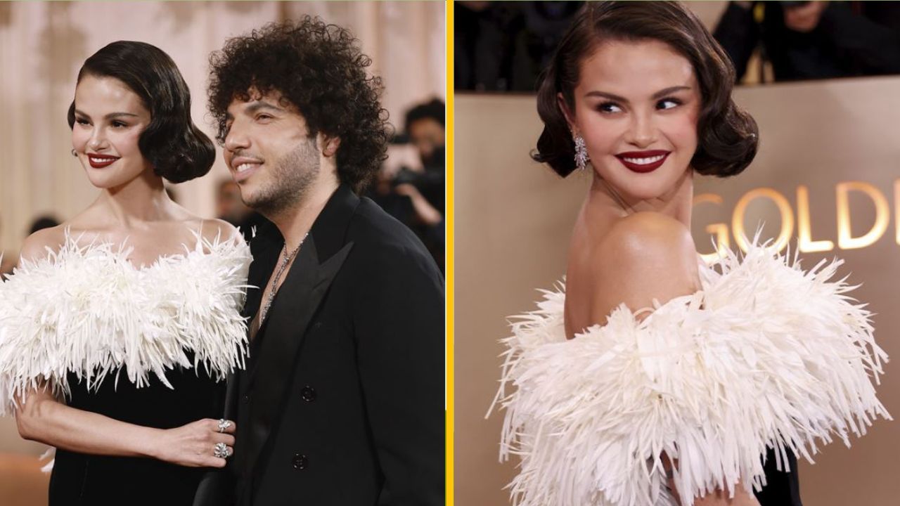 Oslnivý pár na červenom koberci, žena v bielej róbe s pierkami, muž v čiernom obleku. Elegantný večer plný štýlu.