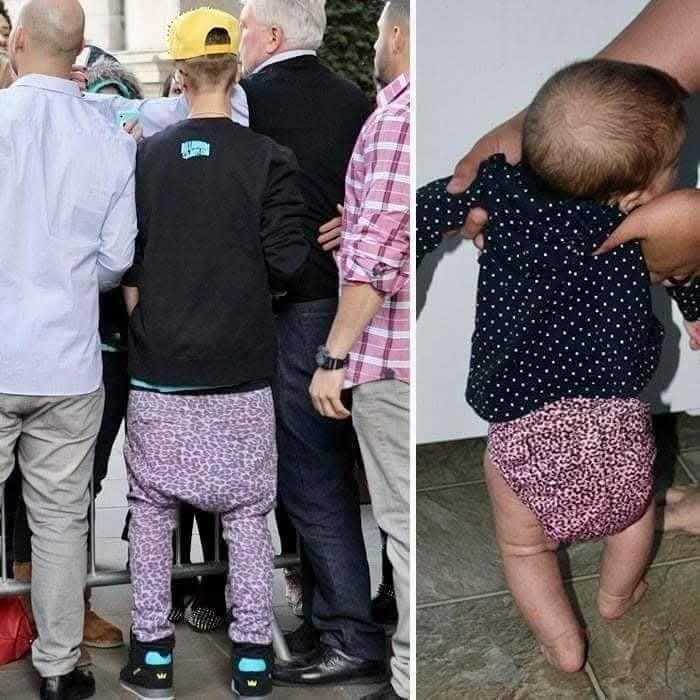 Muž a dieťa v podobných fialových nohaviciach, vtipná módna náhoda štylizujúca módne trendy.