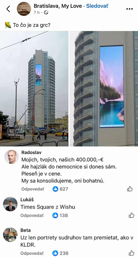 LED reklamná obrazovka na budove v Bratislave s rôznymi reakciami od ľudí v komentároch na sociálnej sieti.