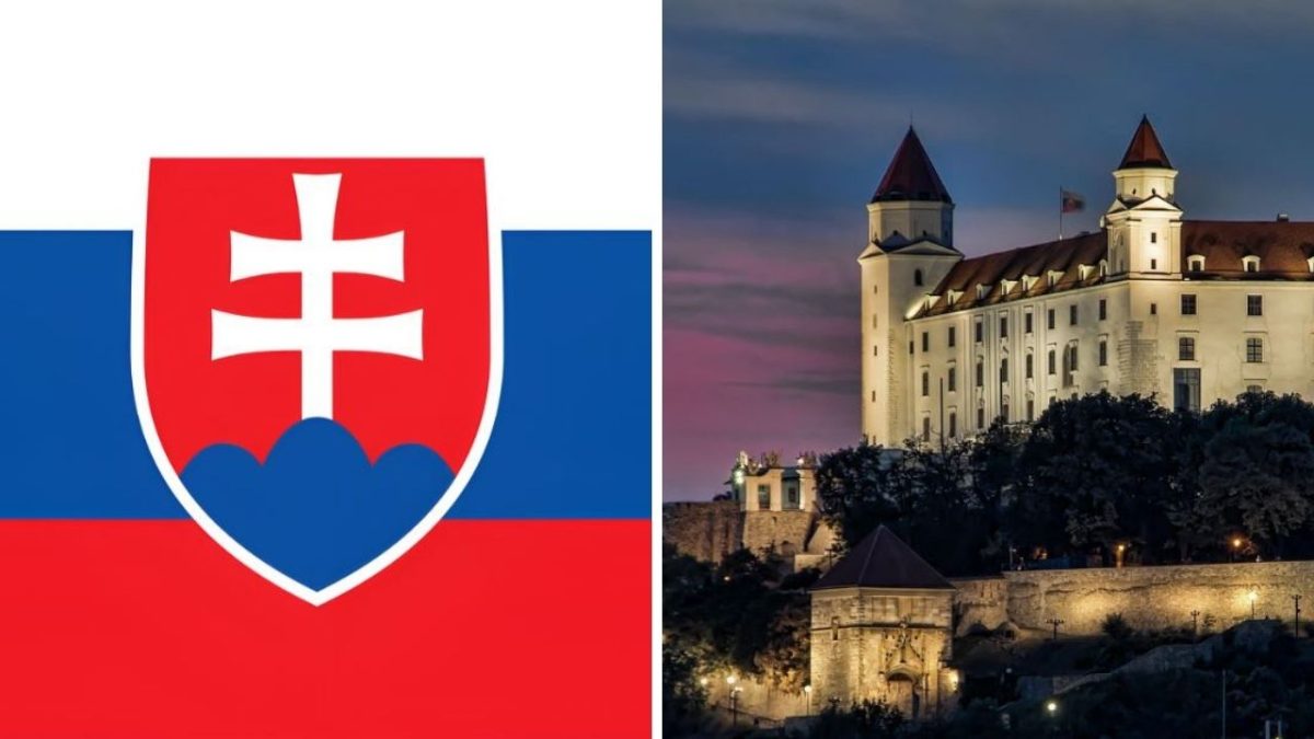 Slovenská vlajka a Bratislavský hrad za súmraku, symboly Slovenska.