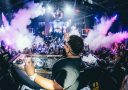 man playing DJ turntable